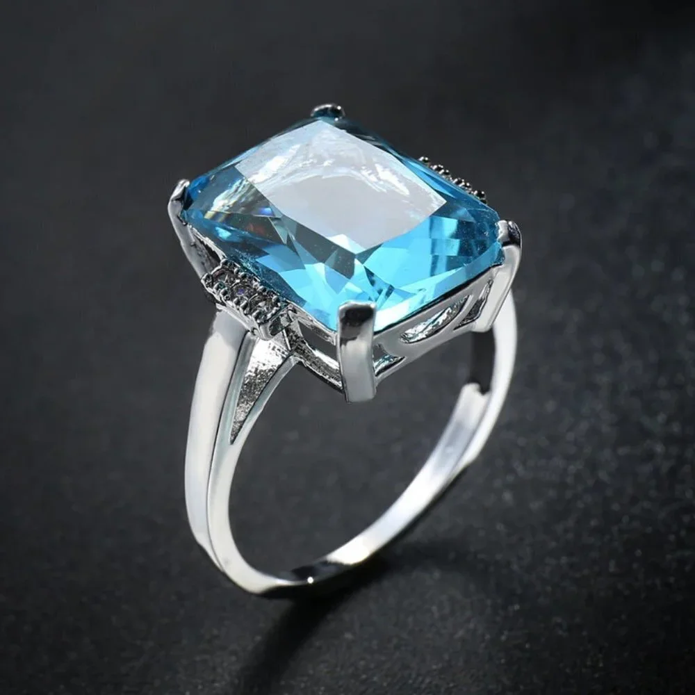 Jewelry ring engagement promise blue emerald rectangle center 925 sterling